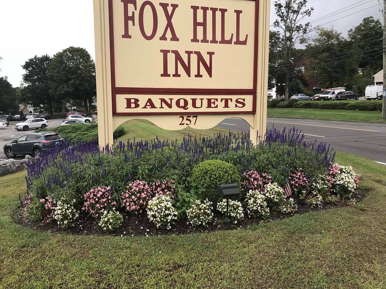 Fox Hill Inn Banquets with shrubs and flower landscaping